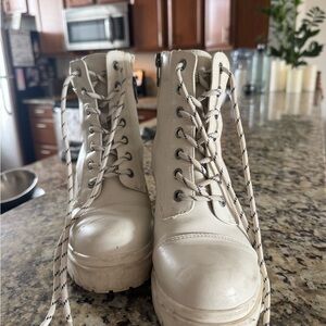 Nine West Quenton lace-up lug sole heeled combat boots